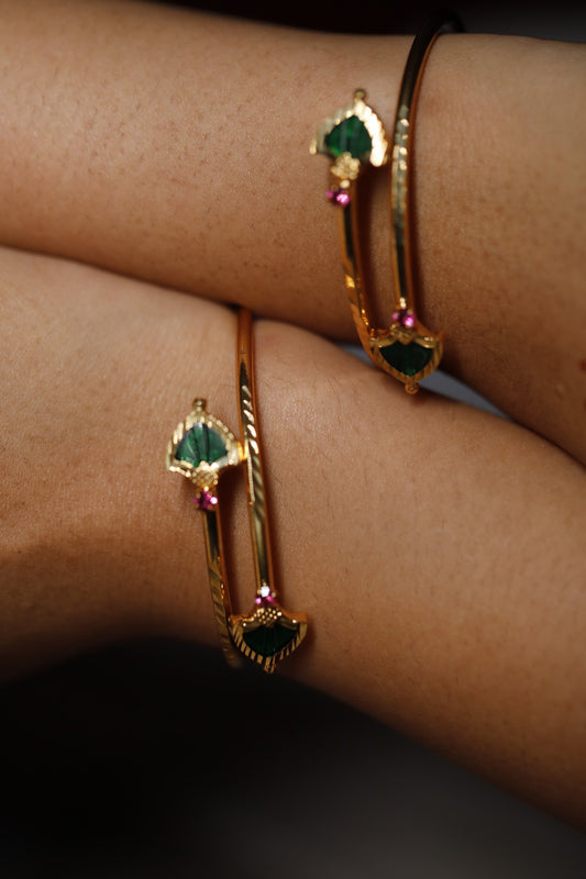 Gold plated Green Palakka stone and ruby red AD stone ajustable bangles styled on wrist