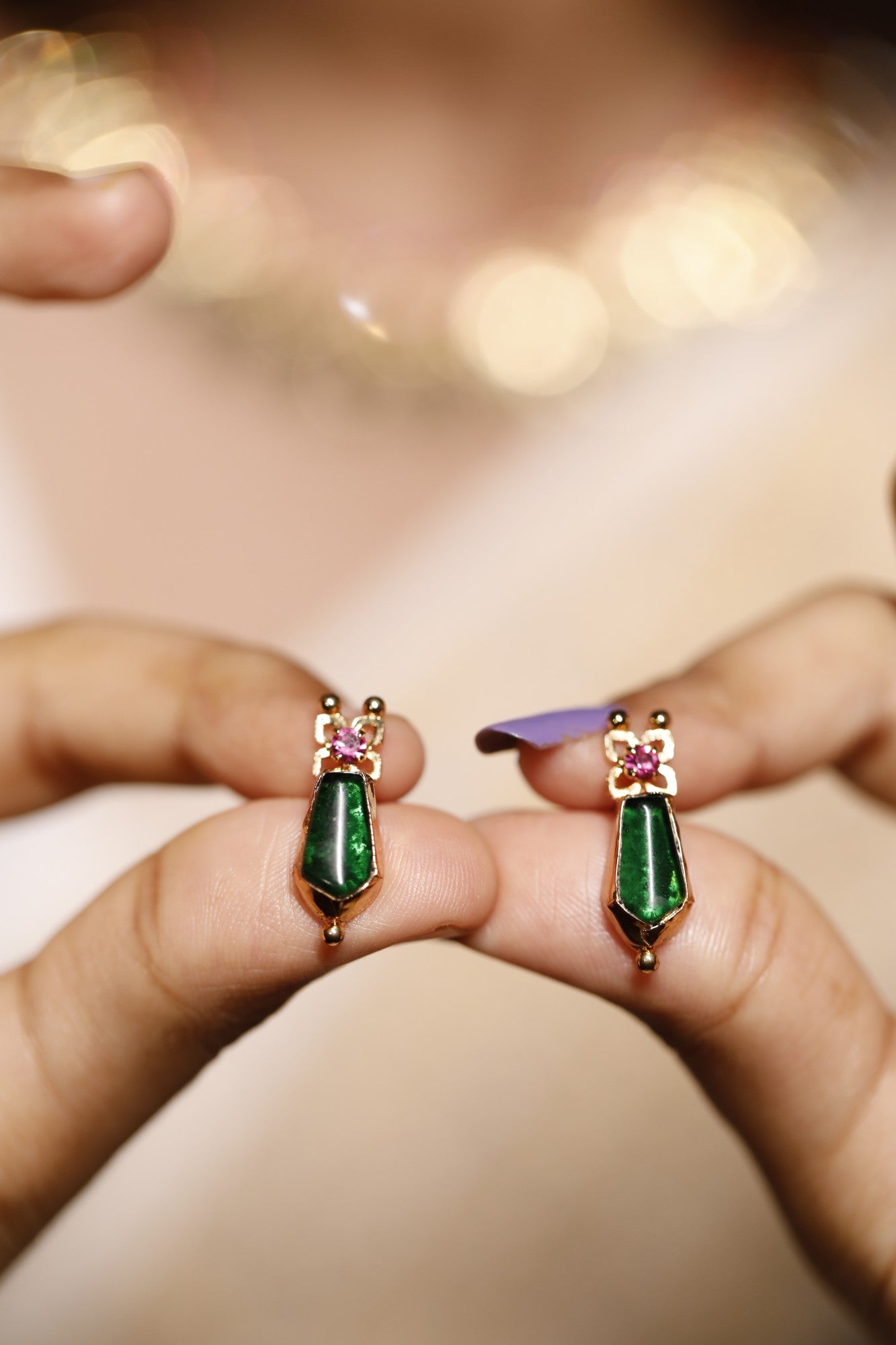 Gold plated nagapadam motif green palakka stone studs